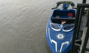 IMG_20161003_090149 Blue speedboat rests near dock
