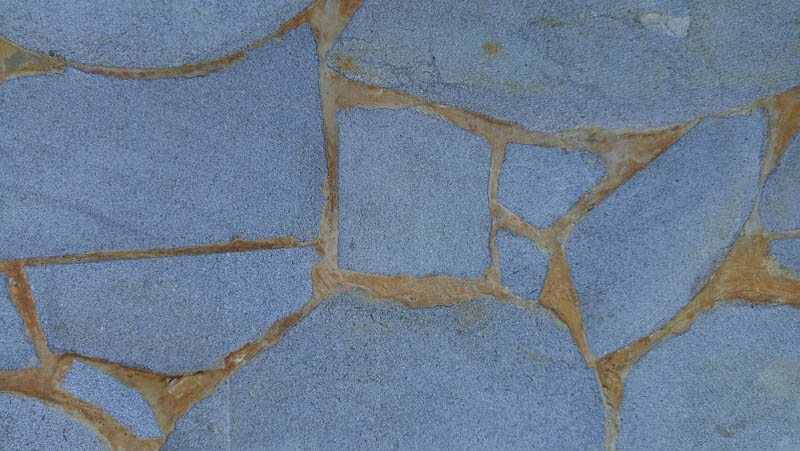 Blue stones form a natural mosaic